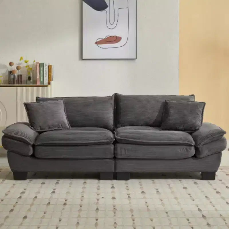Elegante sofá de pana con asiento profundo: tamaño loveseat con almohadas y función de sofá cama