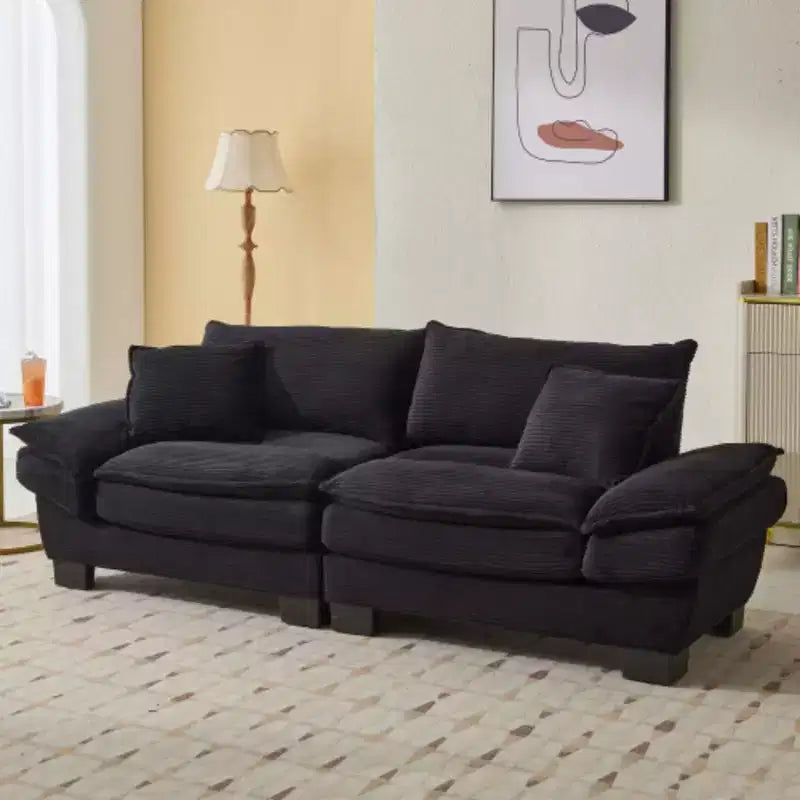Elegante sofá de pana con asiento profundo: tamaño loveseat con almohadas y función de sofá cama