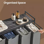 Cesto clasificador de ropa de 45.7 x 13 x 28.4 pulgadas, almacenamiento de cesta de ropa, clasificador de ropa con 4 bolsas extraíbles, estante, estructura de metal, (40L)