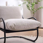 Sillón decorativo moderno y curvo FERPIT con tapicería de lino sintético, cómodo sillón con estructura de metal y cojines