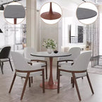 Mesa de comedor redonda LeisureMod Bristol de 27 pulgadas con cubierta de piedra sinterizada y base de pedestal de acero color cerezo para cocina y comedor modernos