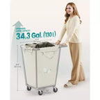 Cesto para la ropa sucia con ruedas, bolsa extraíble, estructura de acero, 130 L