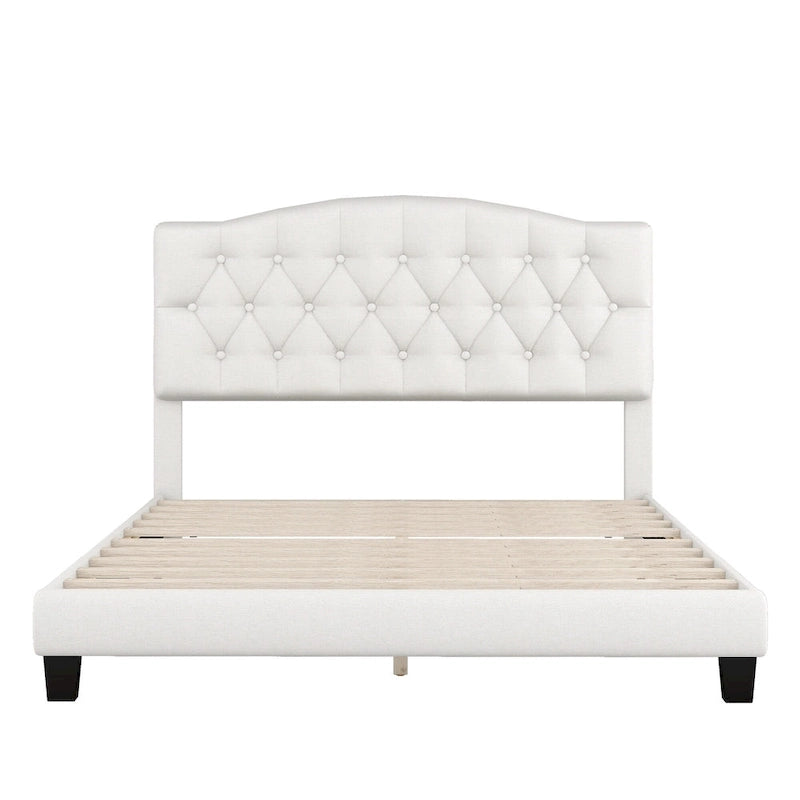 Base de cama tapizada con plataforma, cabecero curvo tipo silla de montar y detalles de rombos capitoné