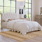Base de cama tapizada con plataforma, cabecero curvo tipo silla de montar y detalles de rombos capitoné