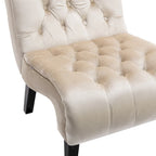 Sillón decorativo de terciopelo beige con capitoné y patas de madera