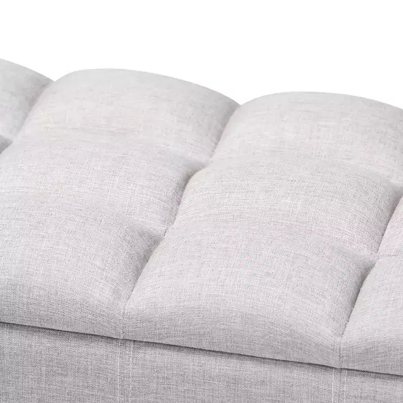 Banqueta de almacenamiento otomana de madera acabada en gris beige Brette - Baxton Studio: moderna de mediados de siglo, capitoné, estructura de madera de caucho, capacidad de 113 kg