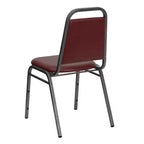 Silla de comedor apilable trasera trapezoidal Emma and Oliver - Asiento de 1.5" de grosor