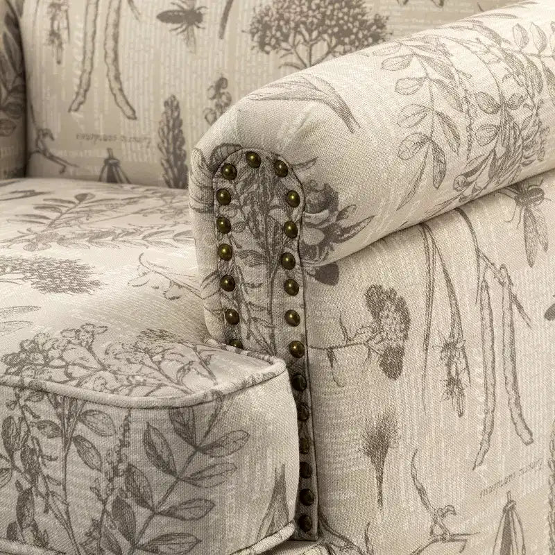 Yahweh Sillón tapizado de madera de transición con diseño de patrón floral, brazos con panel y respaldo de camello | ART OF LIVING DESIGNS