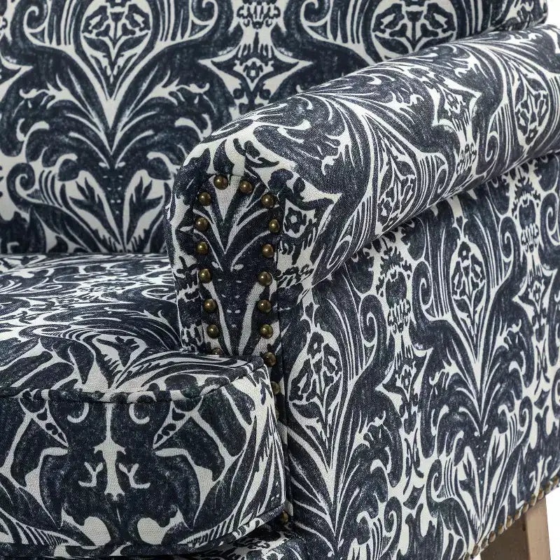 Yahweh Sillón tapizado de madera de transición con diseño de patrón floral, brazos con panel y respaldo de camello | ART OF LIVING DESIGNS
