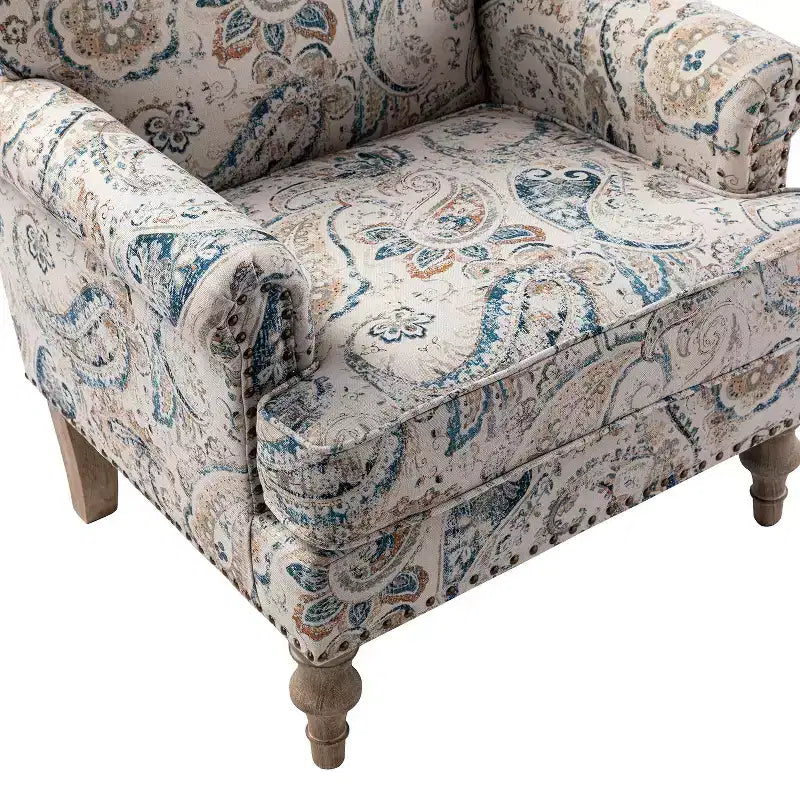 Yahweh Sillón tapizado de madera de transición con diseño de patrón floral, brazos con panel y respaldo de camello | ART OF LIVING DESIGNS
