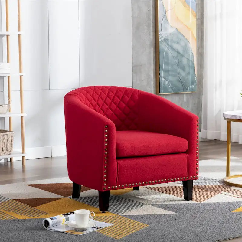 Sillón decorativo Barrel con tachuelas y patas de madera maciza