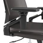Sillón de oficina de piel sintética con respaldo medio, altura y reposabrazos ajustables